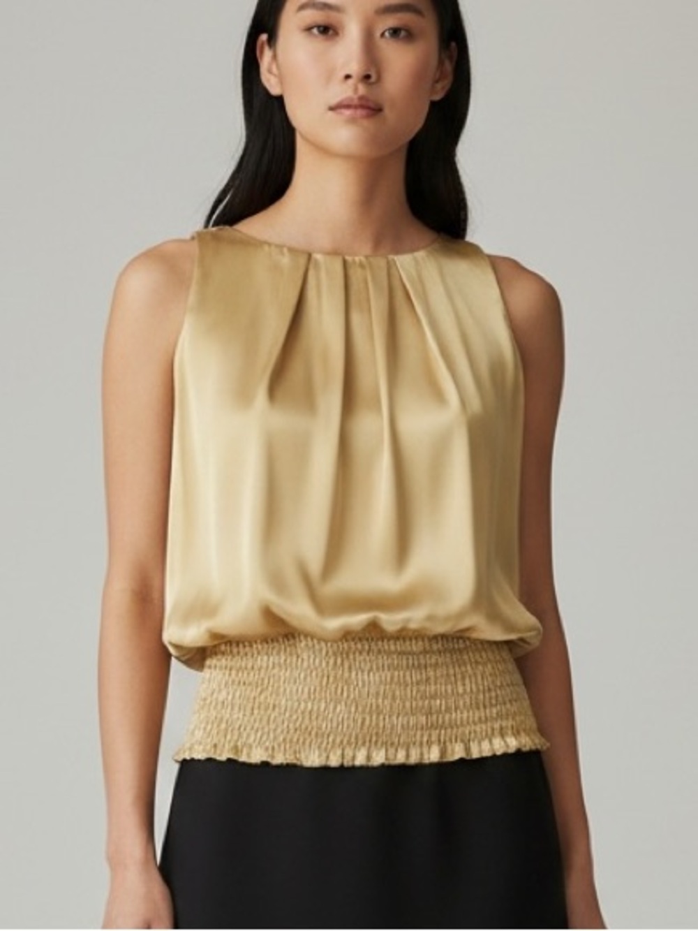 Sleeveless gold/yellow blouse